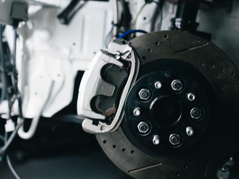 Brake rotor and caliper on a lifted vehicle